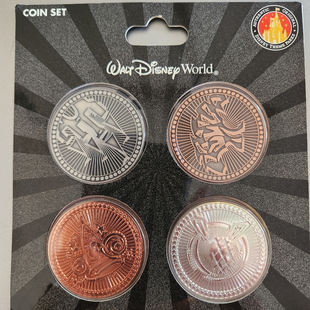 Walt Disney World exclusive Theme Park Icons 4 Coin Set..NEW in park packaging.